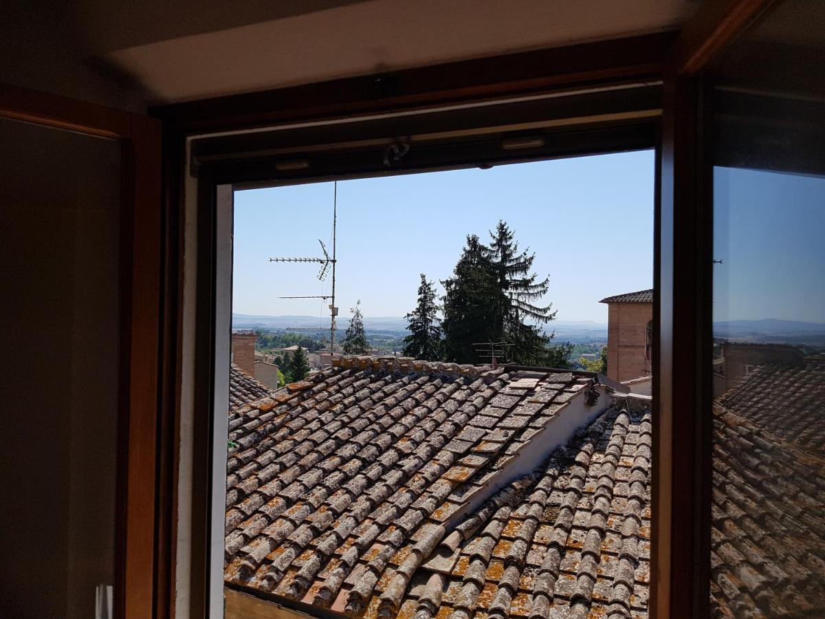 Un Terrazzo Sulla Magia Appartement Siena Buitenkant foto