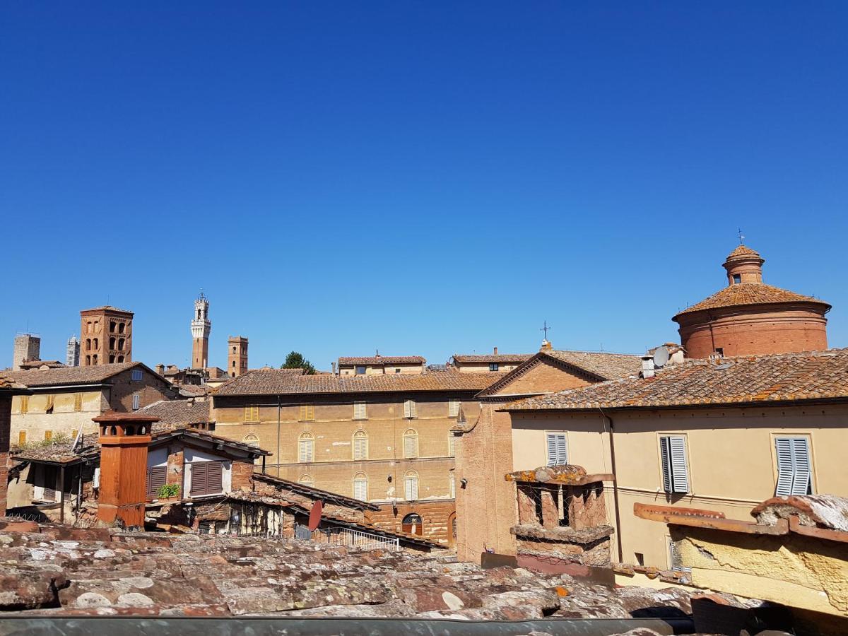 Un Terrazzo Sulla Magia Appartement Siena Buitenkant foto